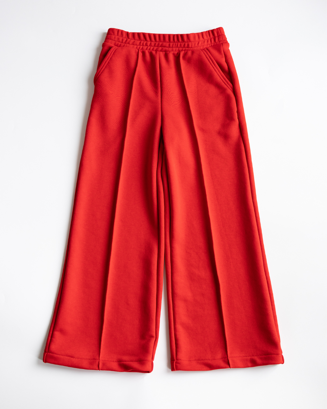 "Red wide-leg cotton girls pants - front view"

