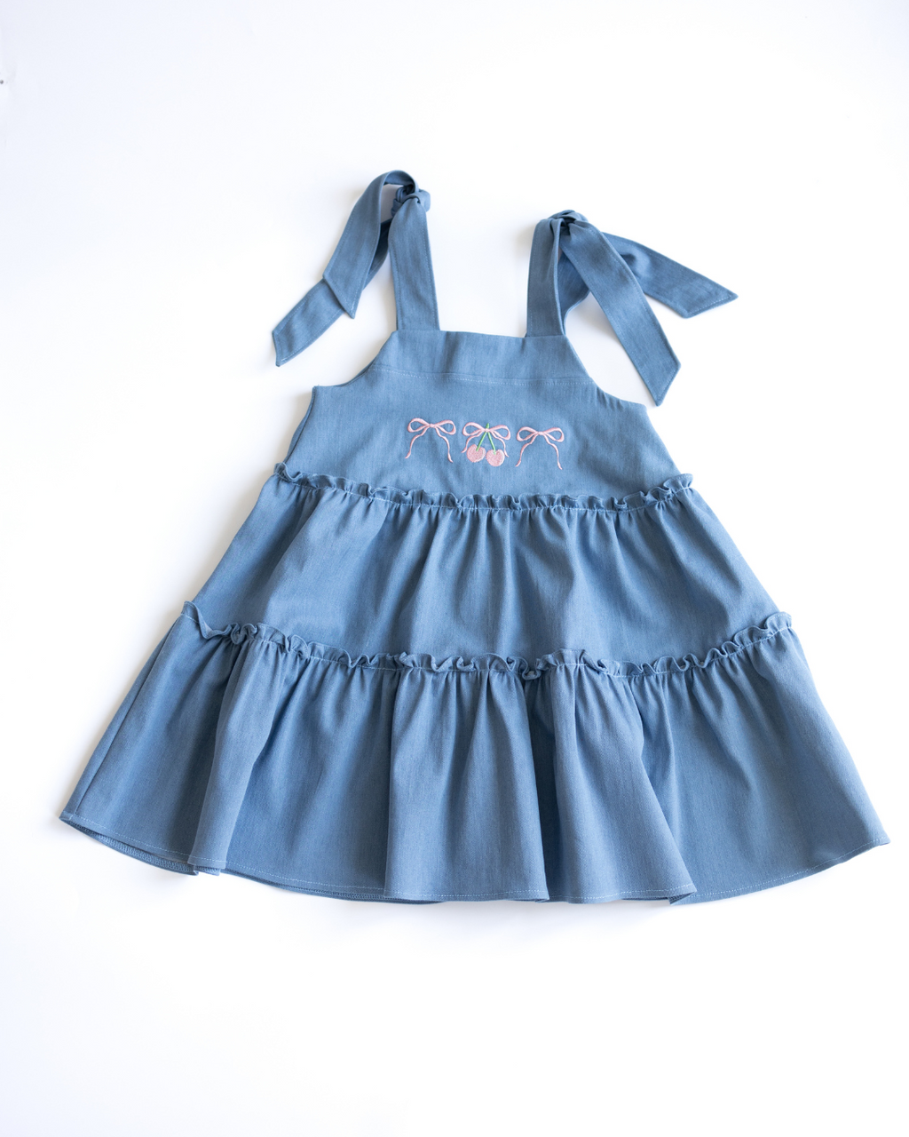 Light blue denim dress for girls with cherry embroidery front view
