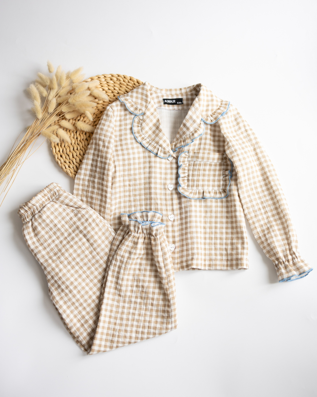 Beige girls' muslin pajama set with ruffle trim – full view by Alwair Kids