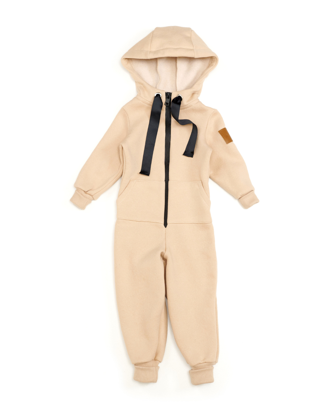 Beige fleece-lined kids hooded jumpsuit with black zipper and drawstrings – front view