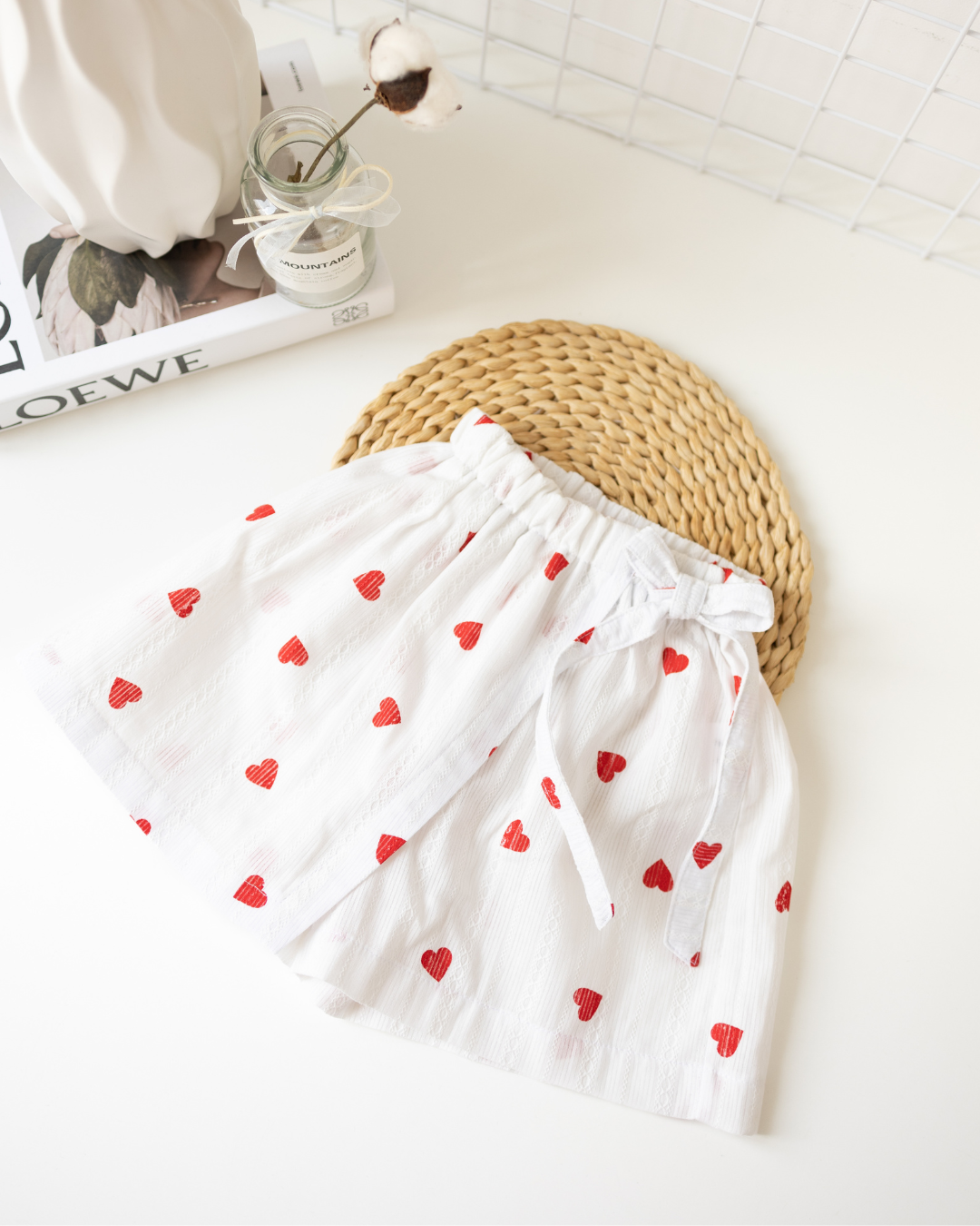 White and red girls' summer skort with heart print and bow – front view – Alwair Kids

