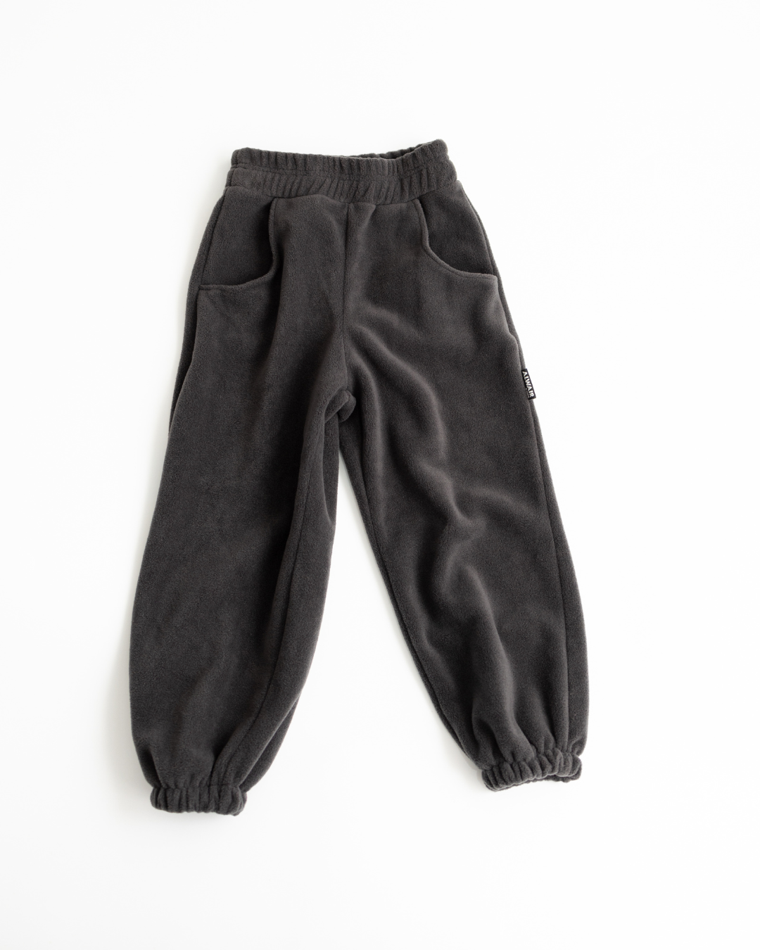 Charcoal fleece jogger pants for kids by Alwair Kids flat lay