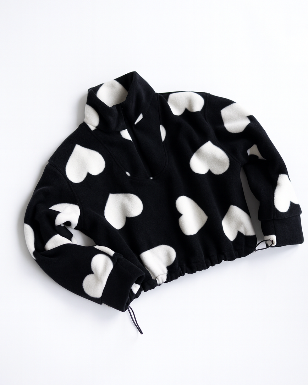 Black fleece pullover for girls with white heart print by Alwair Kids