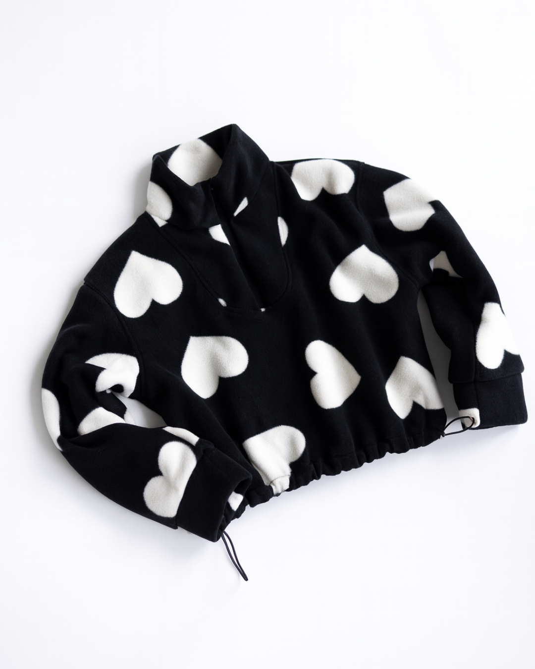 Black fleece pullover for girls with white heart print by Alwair Kids