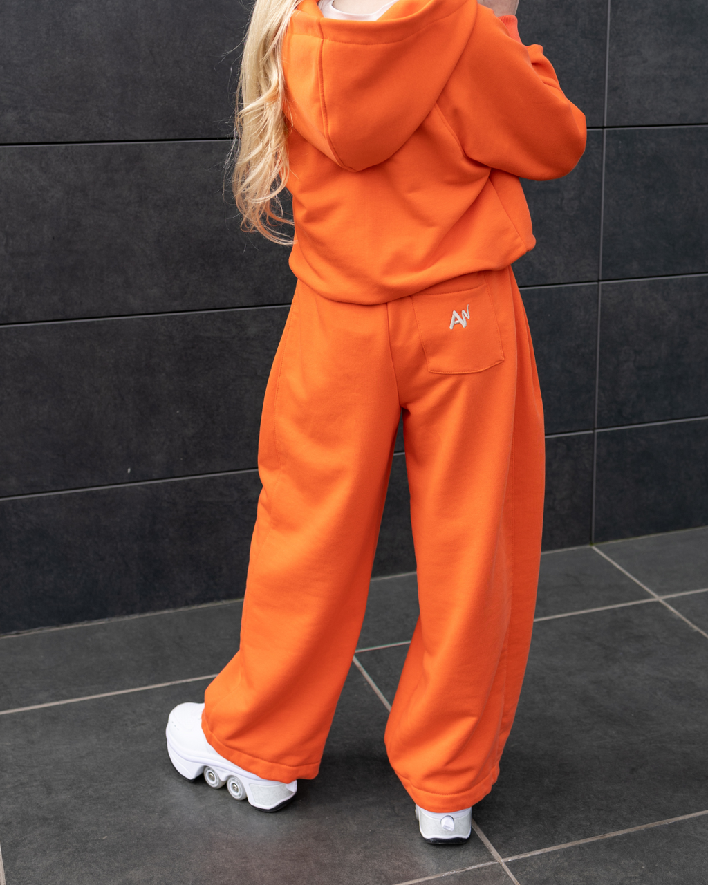 Back view of Alwair Kids orange girls pants with hooded sweatshirt