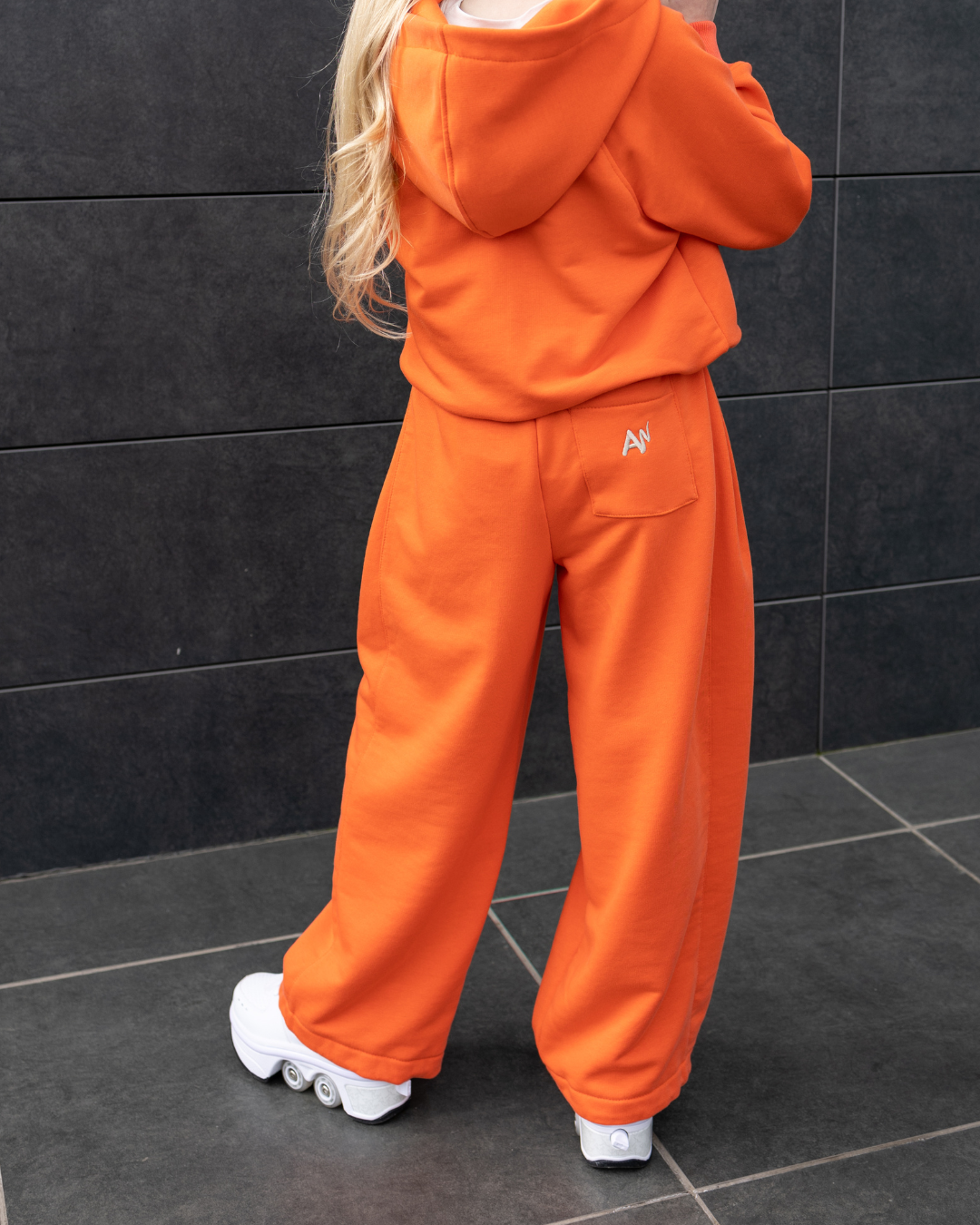 Back view of Alwair Kids orange girls pants with hooded sweatshirt