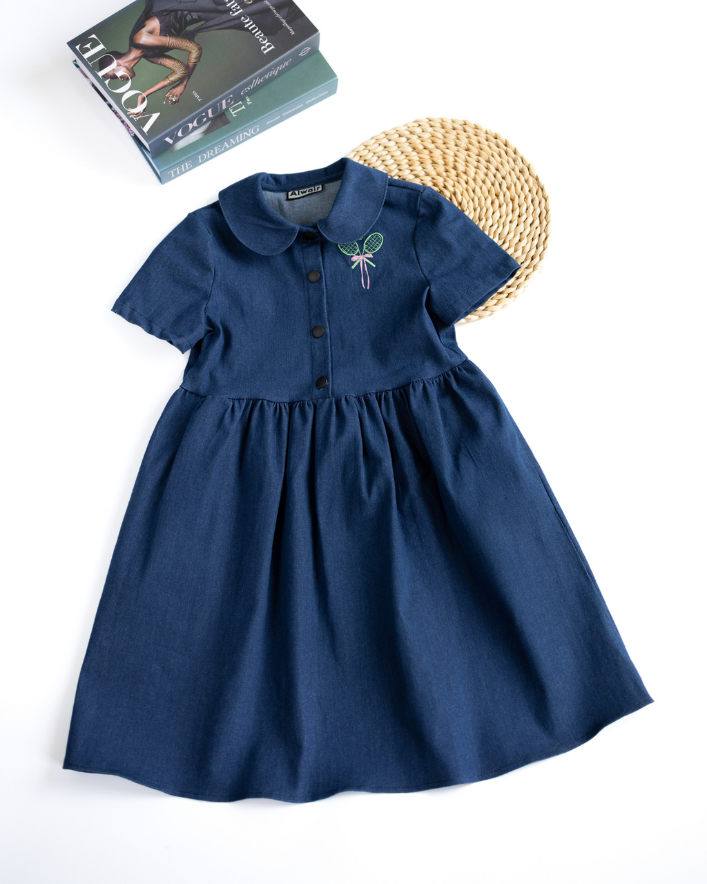Flat lay of dark blue denim tennis dress for girls by Alwair Kids