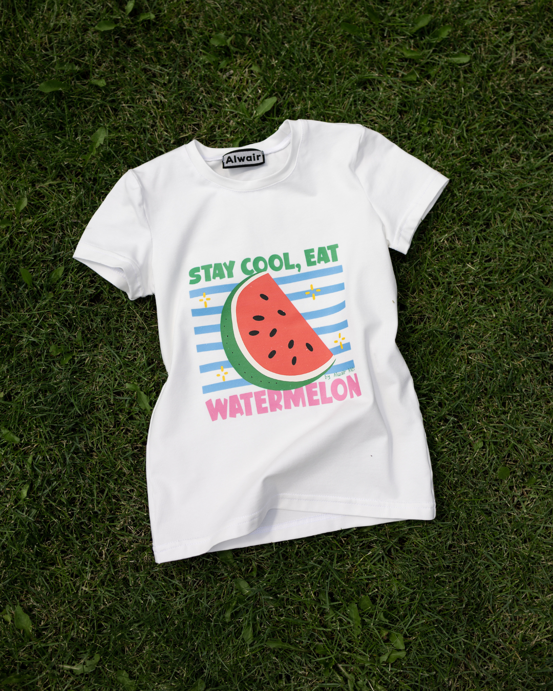 fun watermelon print kids t-shirt on grass stay cool summer outfit by Alwair Kids