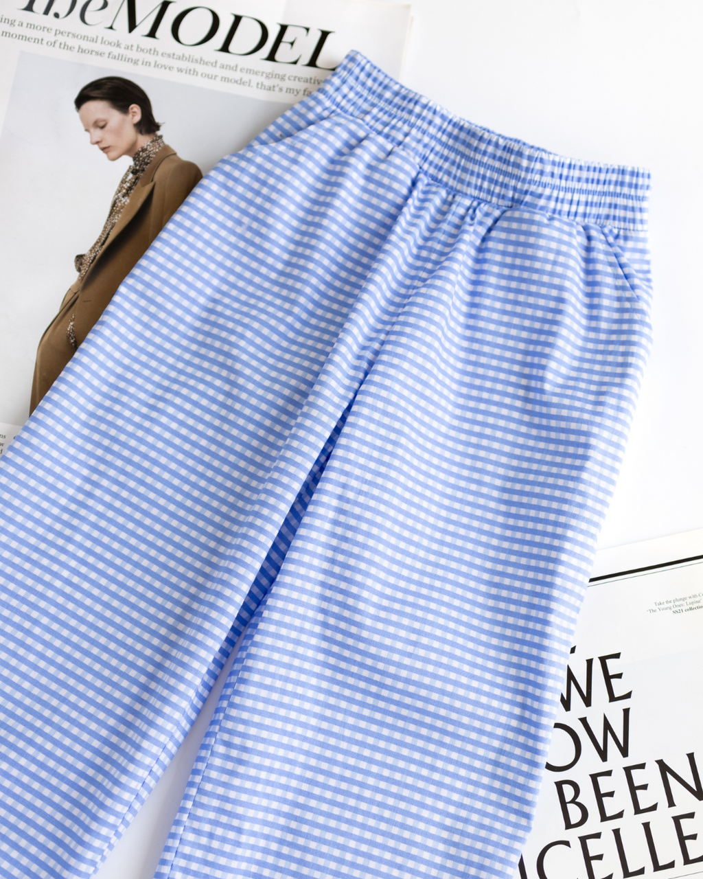 Close-up of elastic waistband and gingham fabric texture - summer kids pants by Alwair Kids