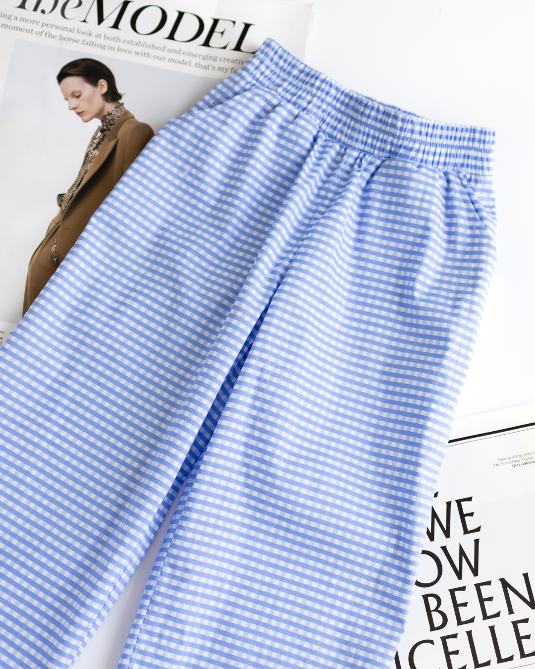 Close-up of elastic waistband and gingham fabric texture - summer kids pants by Alwair Kids
