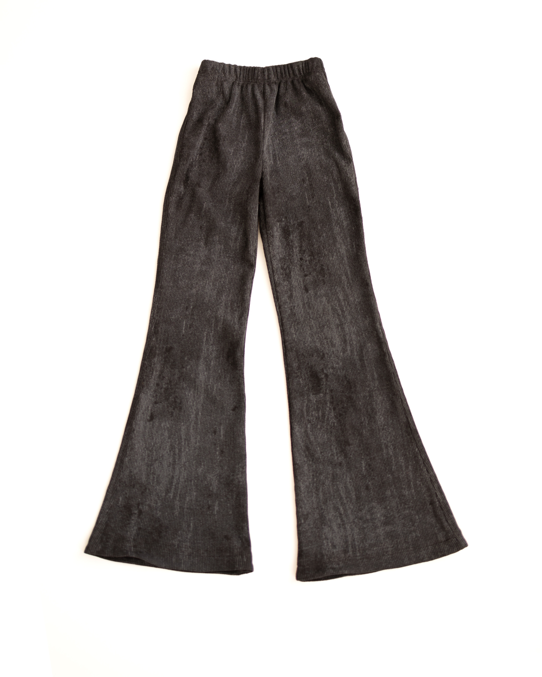 Black ribbed cotton flared leggings for girls flat lay by Alwair Kids
