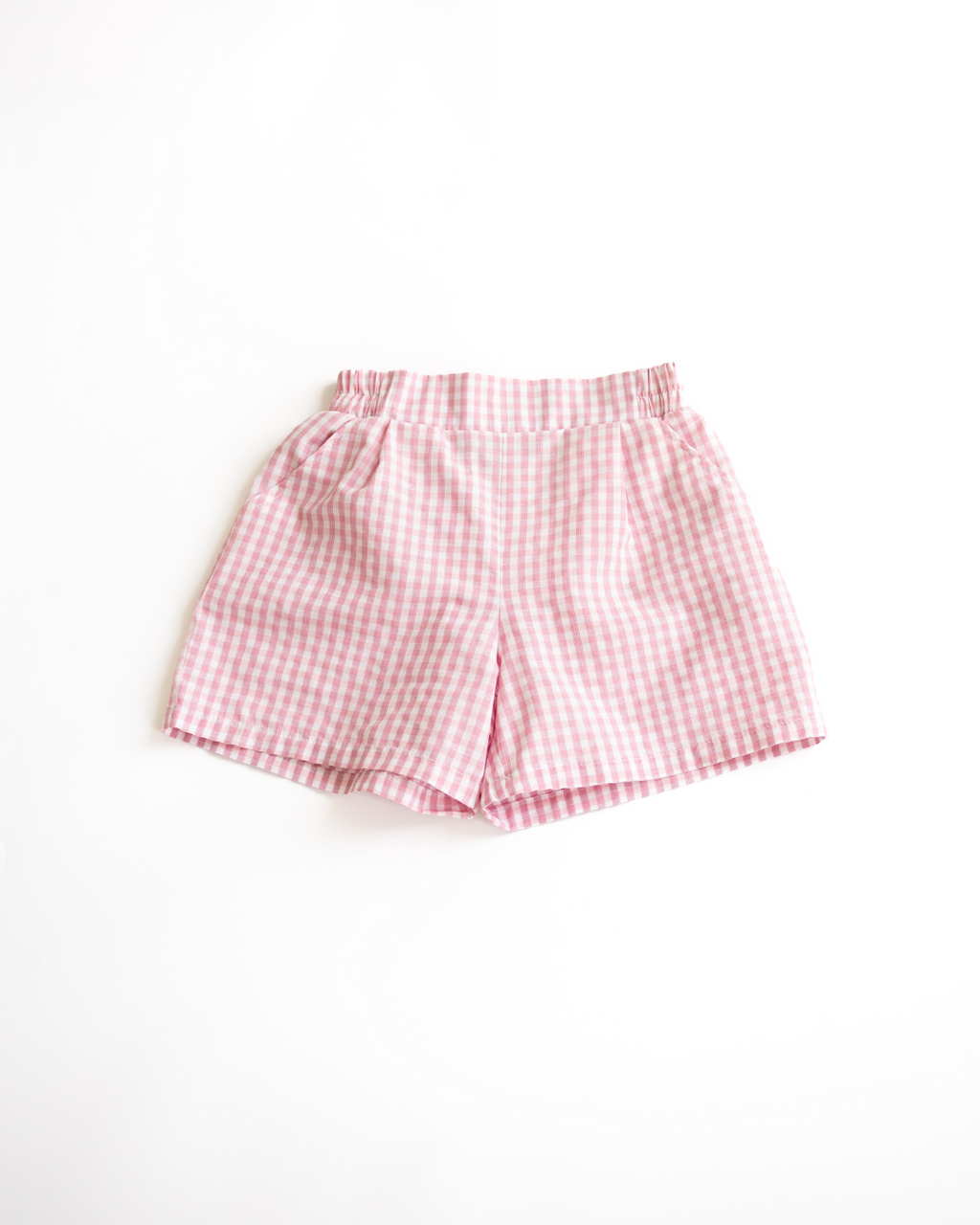Front view of pink gingham cotton shorts for toddler girls by Alwair Kids