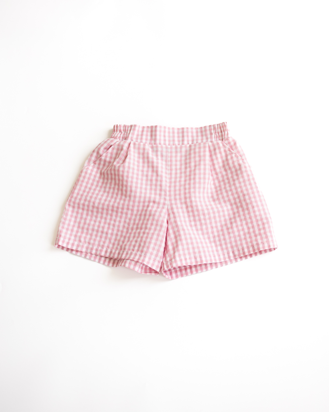 Front view of pink gingham cotton shorts for toddler girls by Alwair Kids