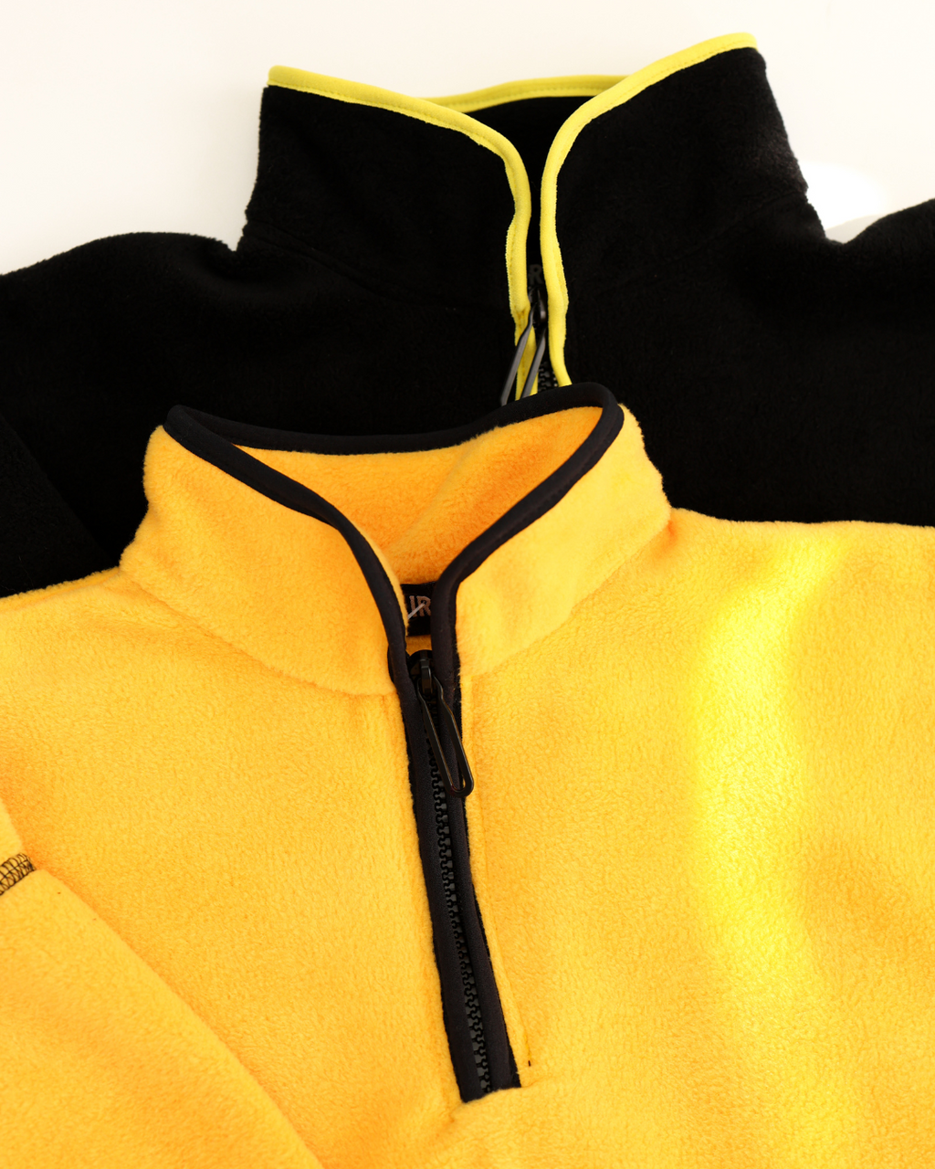 Half-zip collar detail of kids fleece pullover Alwair Kids yellow version