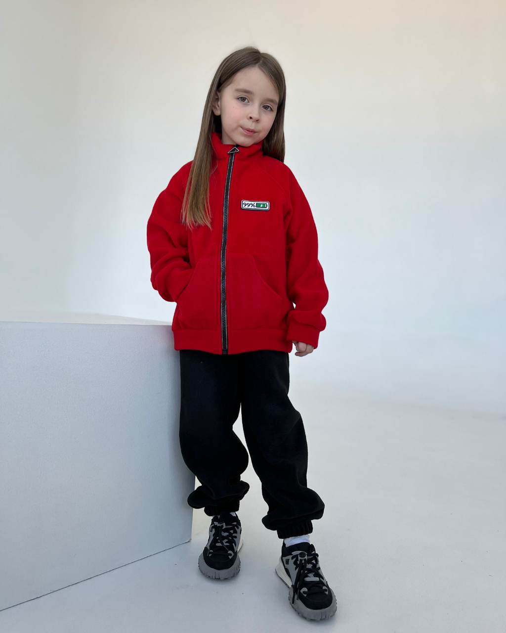 Red fleece zip jacket for kids with 99% energy mood patch by Alwair Kids