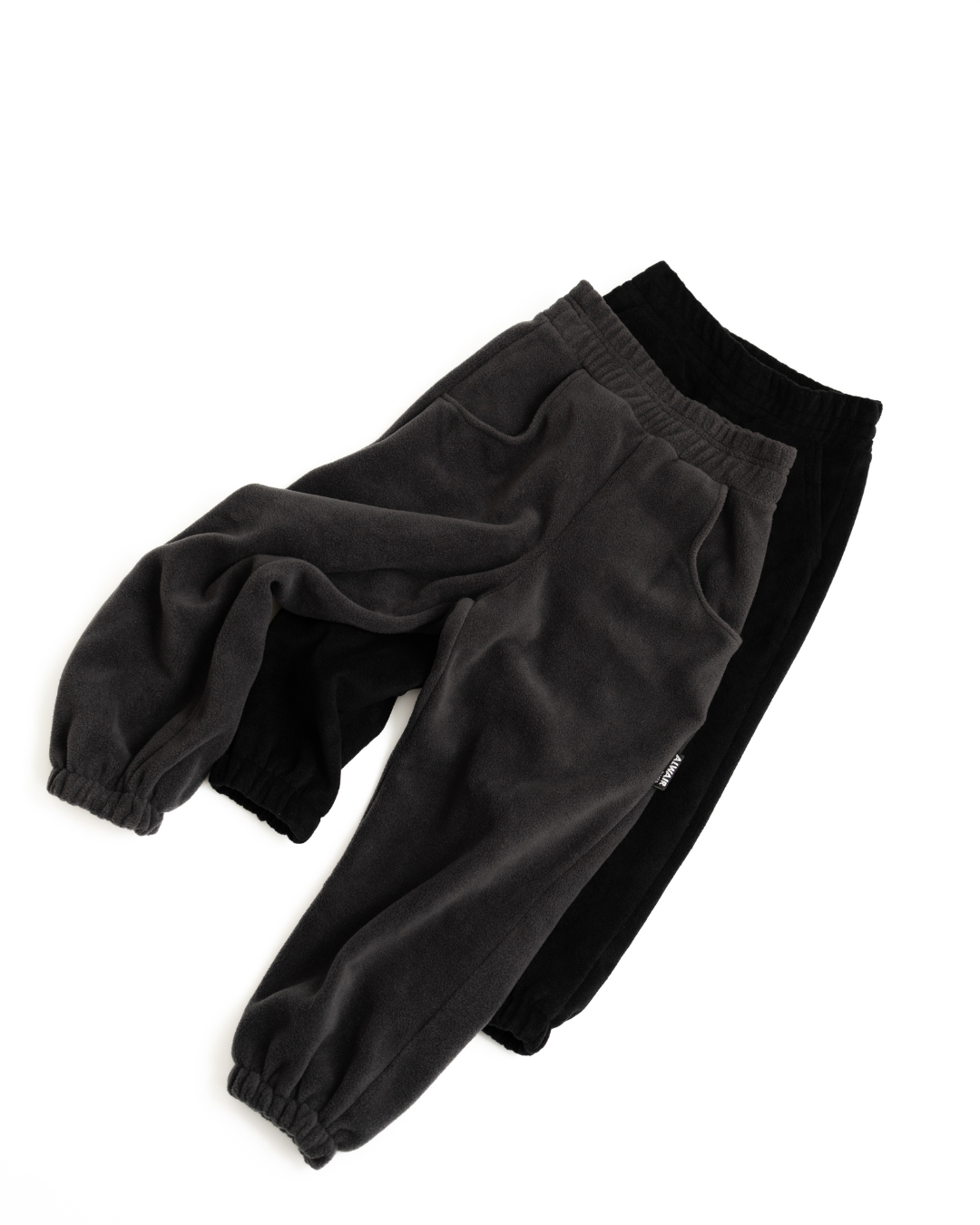 Set of two kids fleece jogger pants in black and charcoal by Alwair Kids