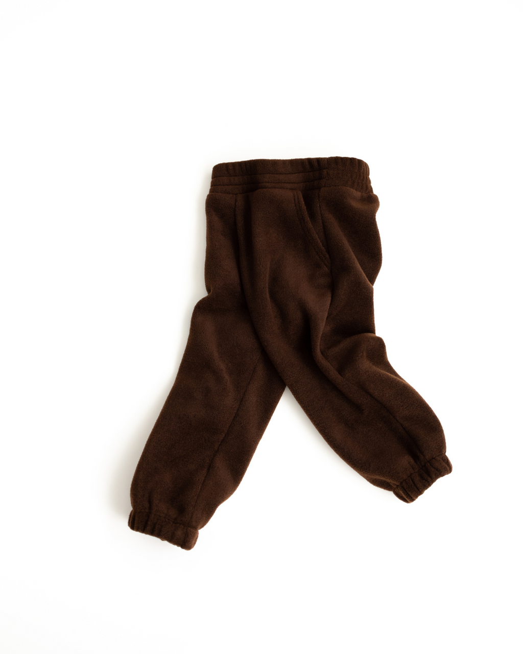 Soft fleece pants for children with elastic waistband and cuffs