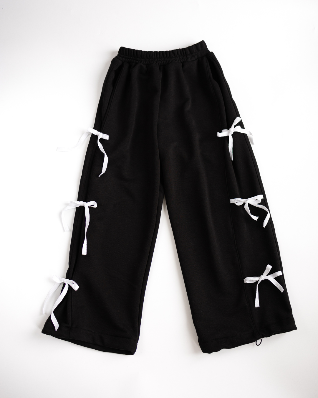 Black girls palazzo pants with bright white ribbons by Alwair Kids