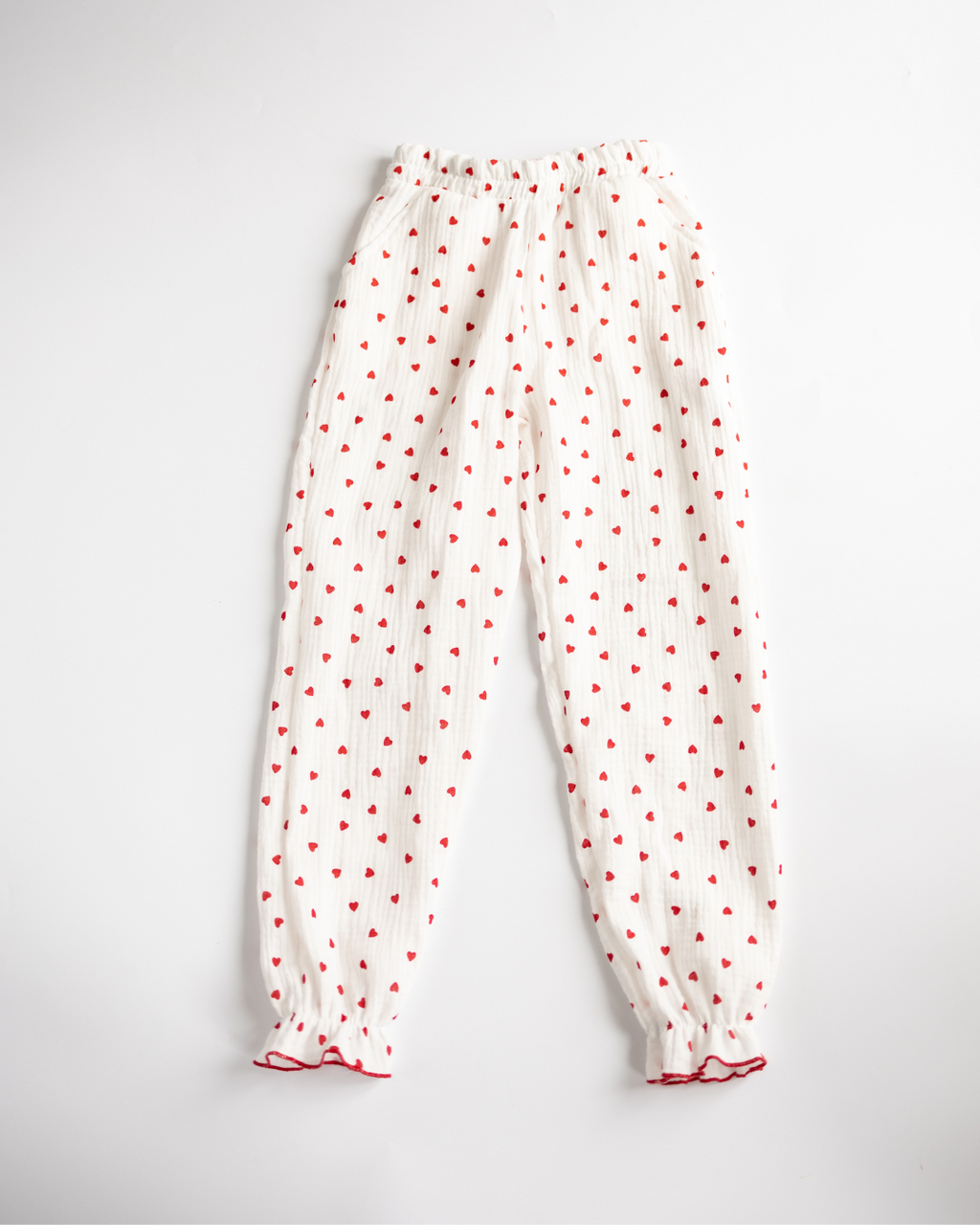 Elastic-waist muslin pajama pants for girls with red heart print