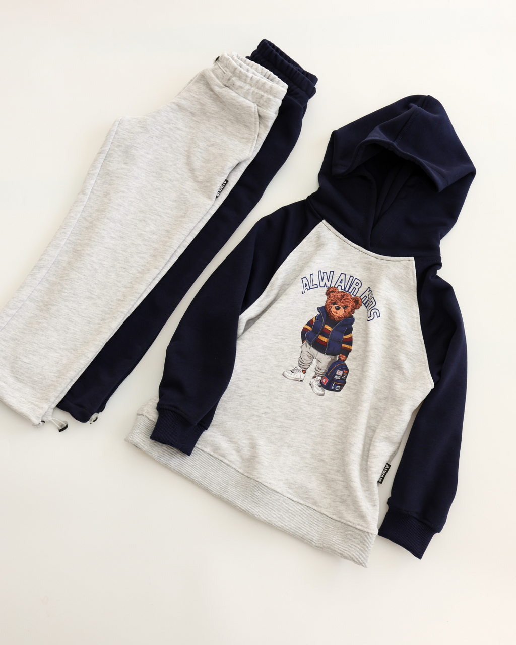 Boys cotton hoodie and joggers set with teddy bear print by Alwair Kids in navy and grey