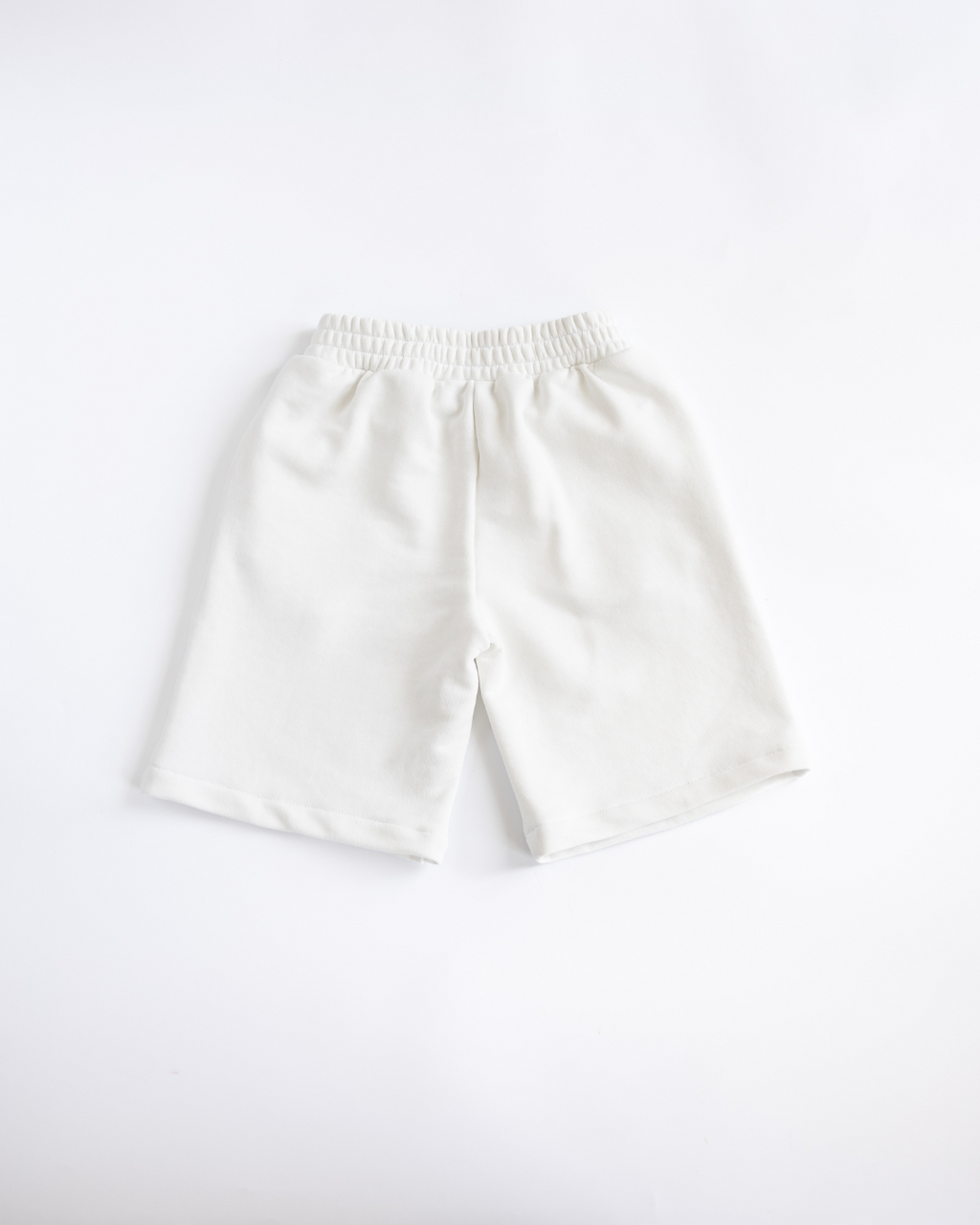 White boys shorts by Alwair Kids back view elastic waistband