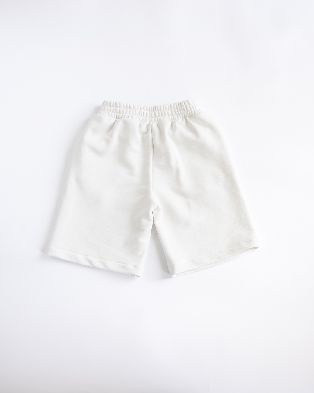 White boys shorts by Alwair Kids back view elastic waistband