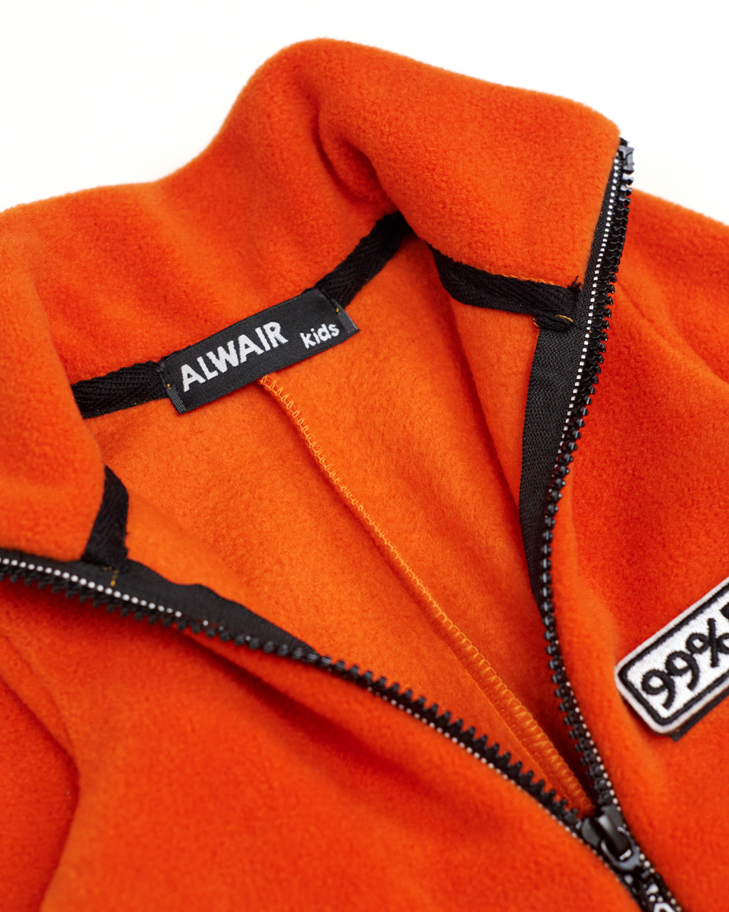 Alwair Kids brand label inside fleece jumpsuit collar