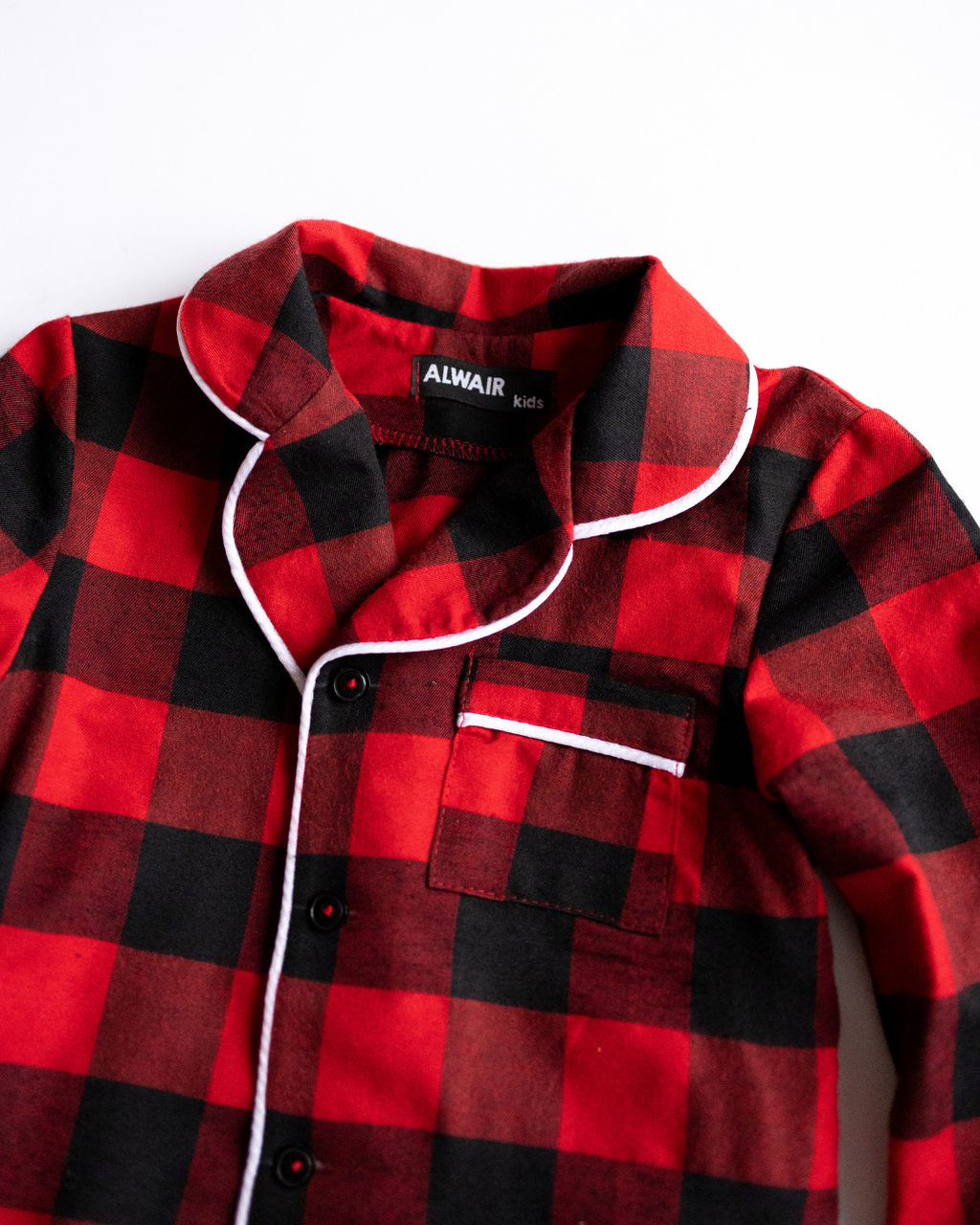 Close-up of cotton pajama shirt collar and pocket – Alwair Kids