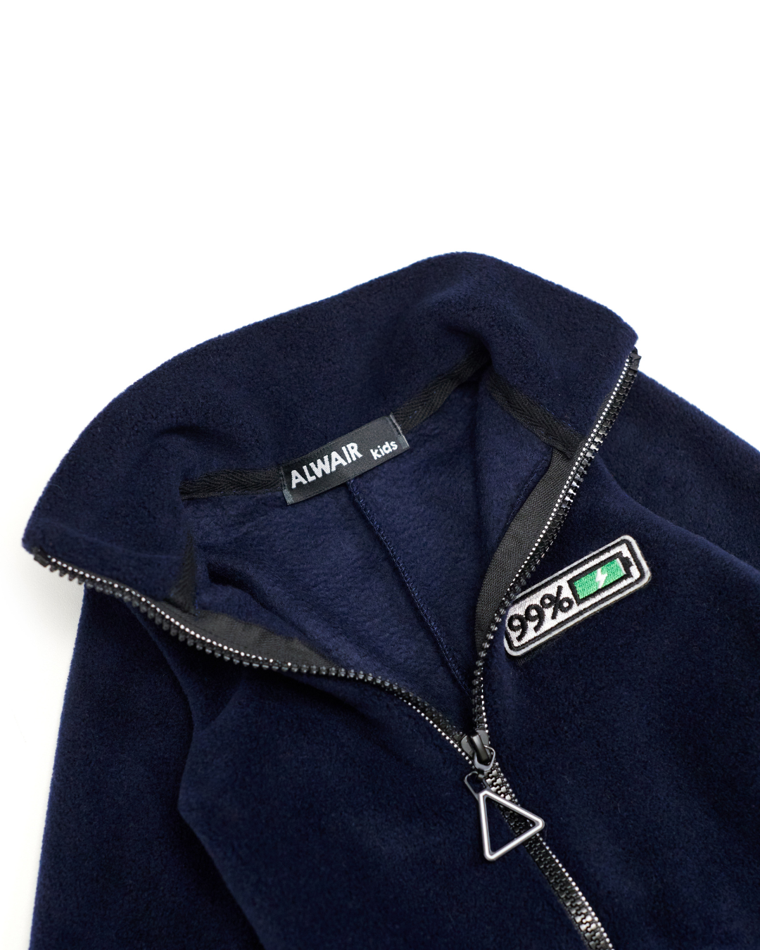 Alwair Kids brand label inside collar of dark navy fleece jumpsuit
