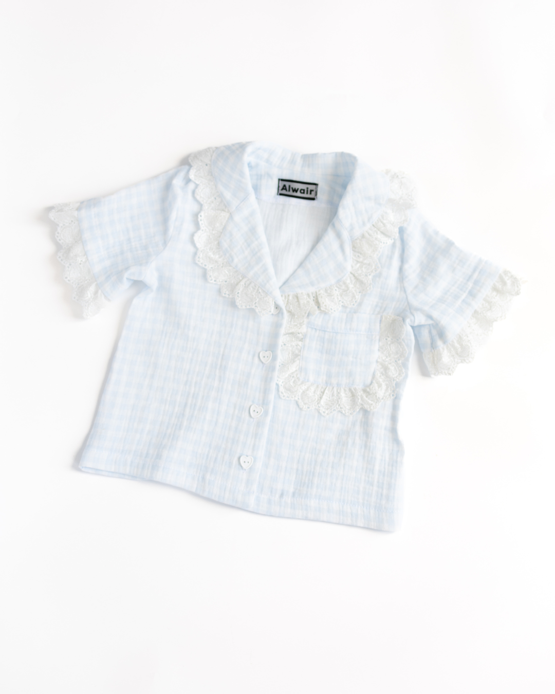 Close-up of blue pajama shirt with heart-shaped buttons and lace collar - Alwair Kids