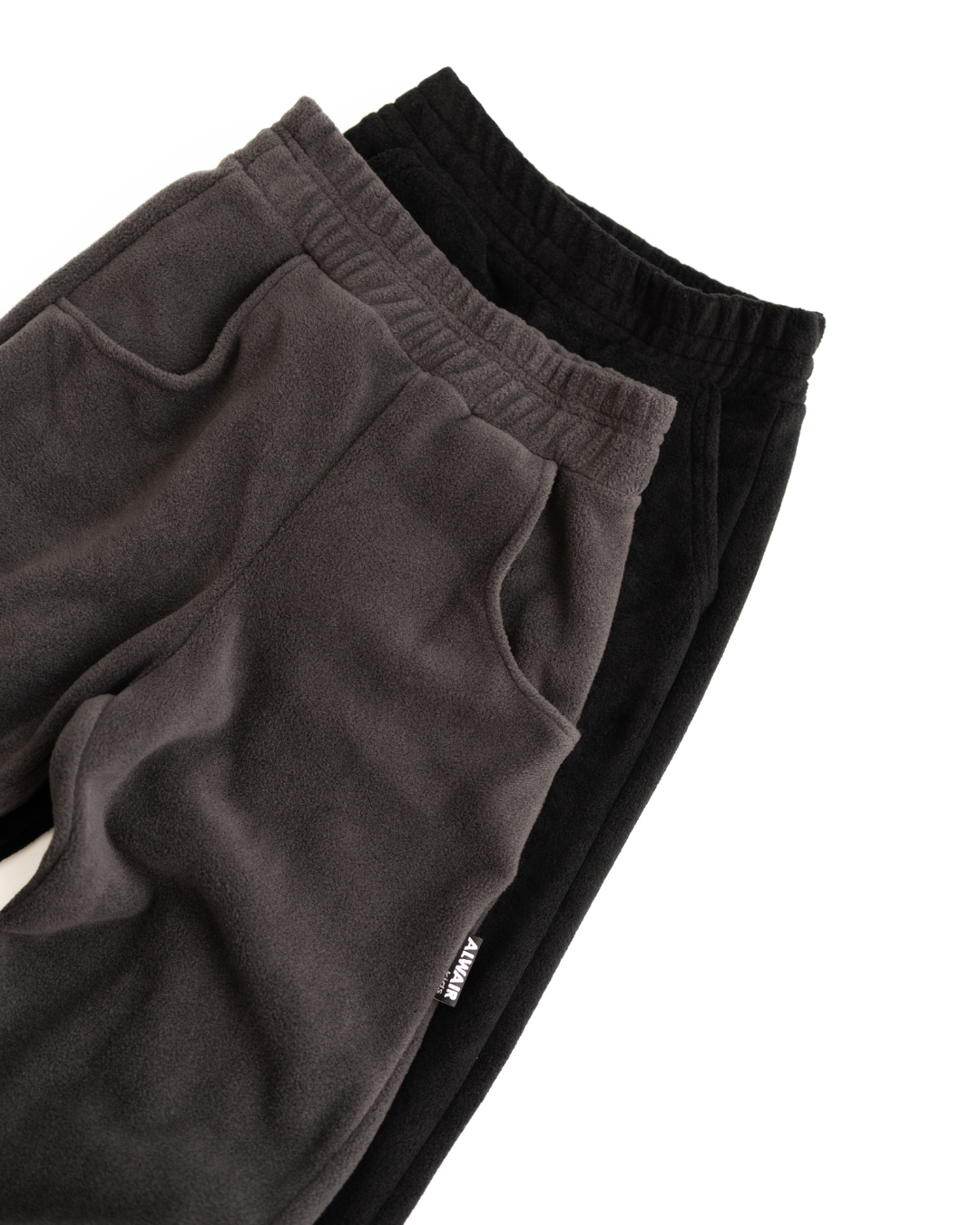 Close-up of elastic waistband and fleece texture on kids jogger pants