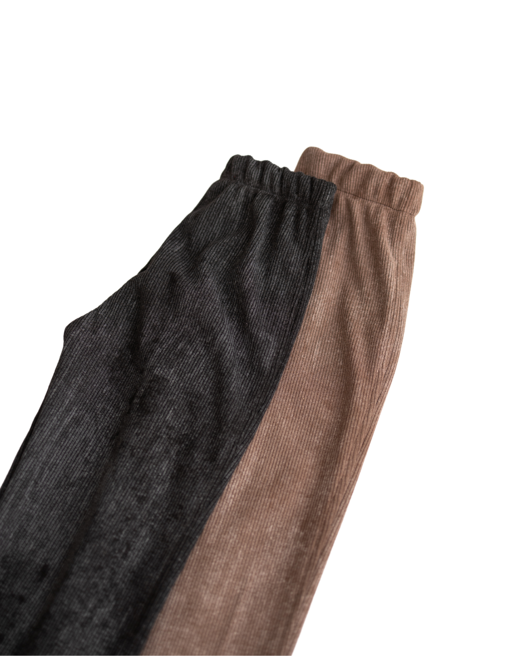 Close-up of elastic waistband on ribbed cotton leggings for girls