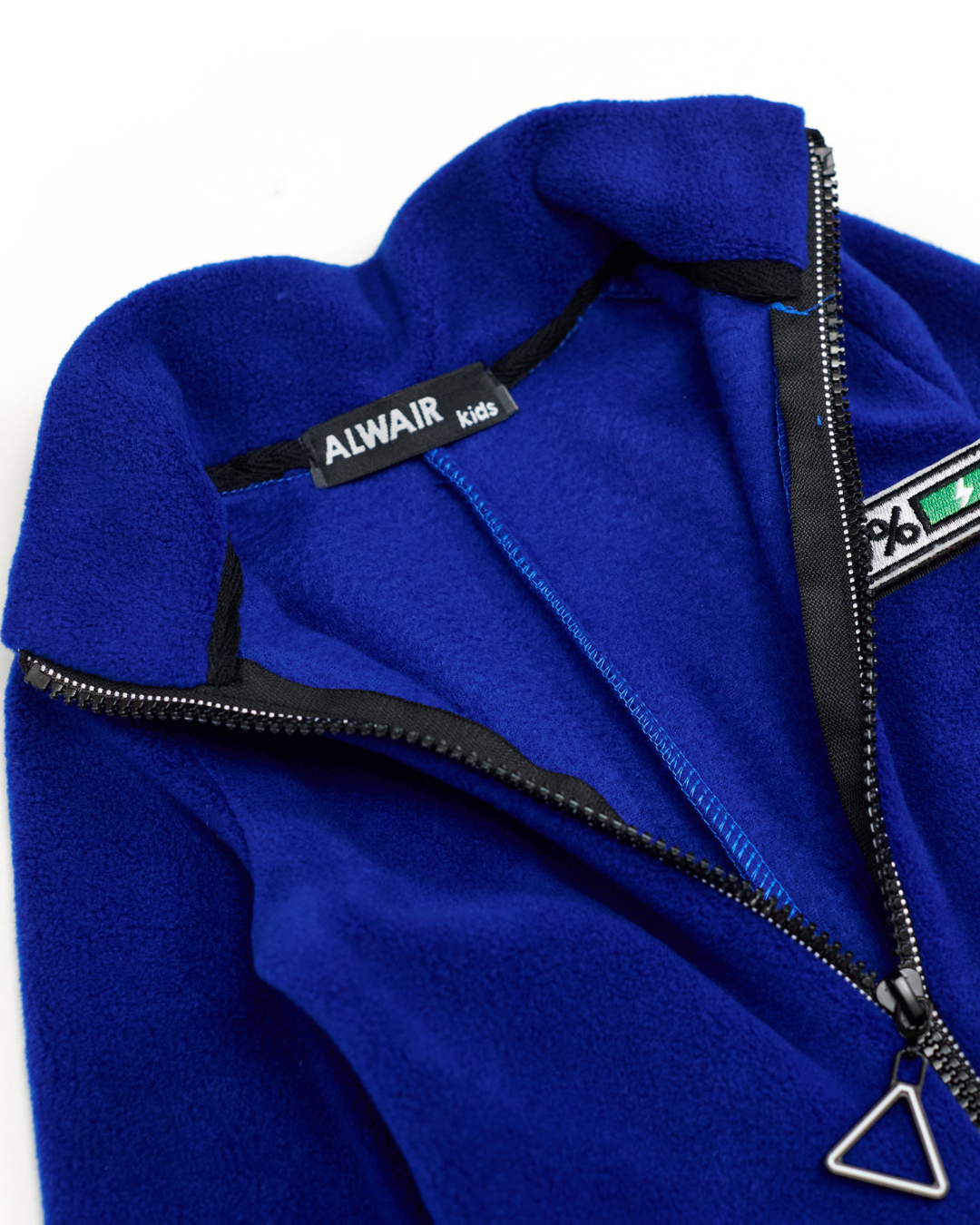 Alwair Kids label inside navy fleece jumpsuit collar