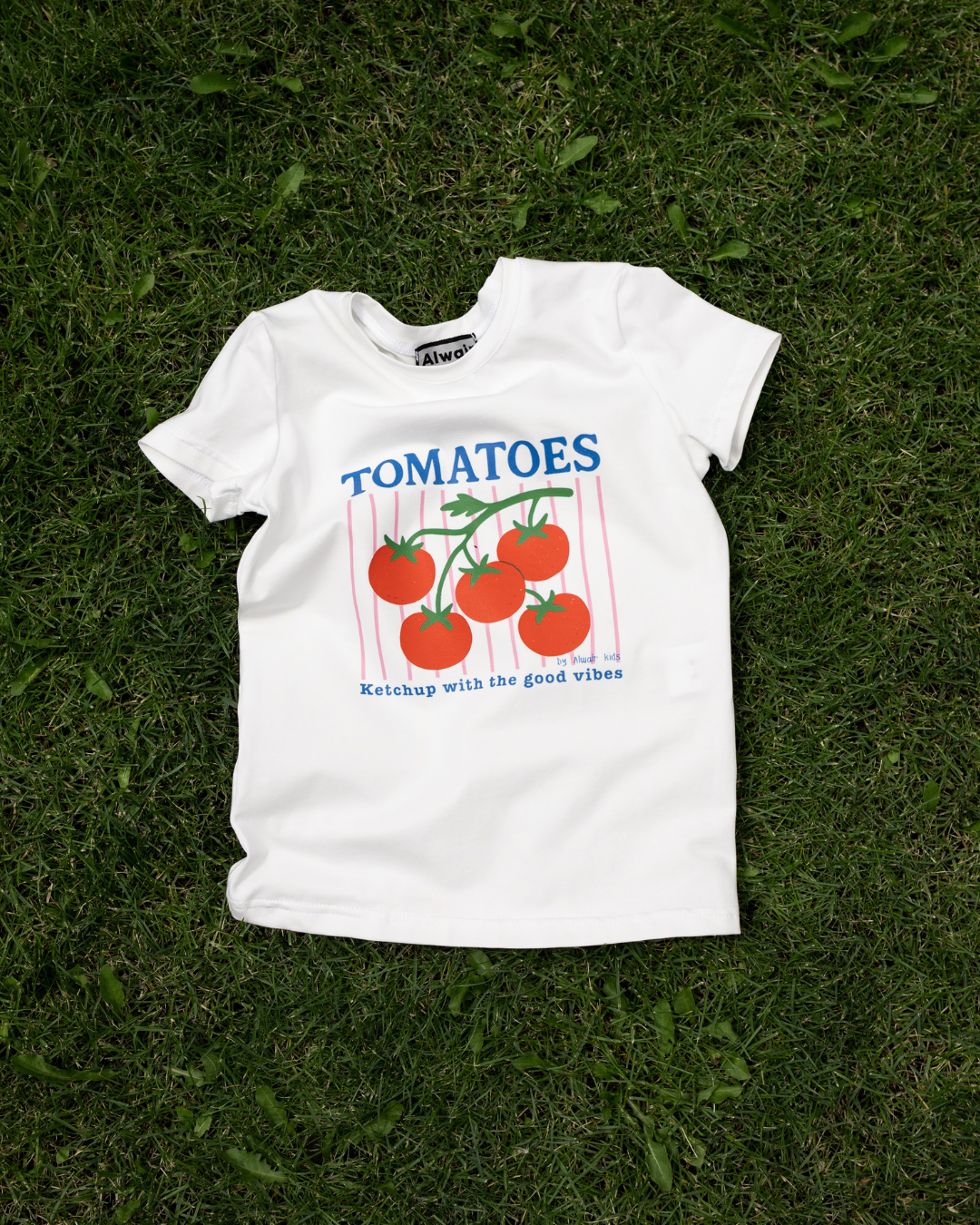 tomatoes graphic t-shirt for children on summer grass ketchup with the good vibes Alwair Kids