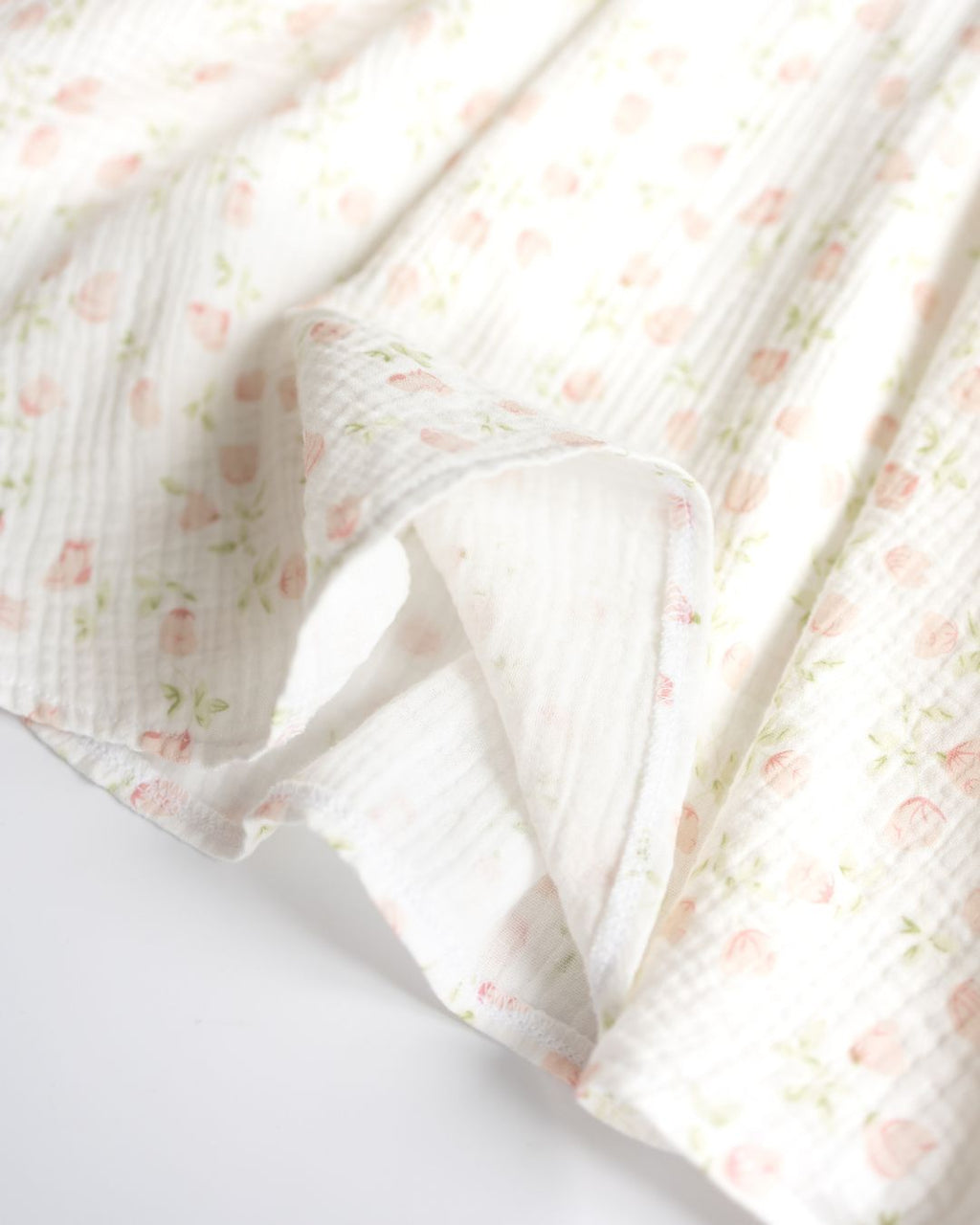 Hem and stitching detail of muslin girls dress Alwair Kids