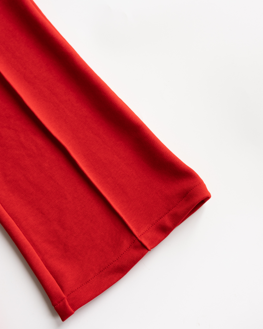 Bottom hem and stitching detail - red DIANA pants