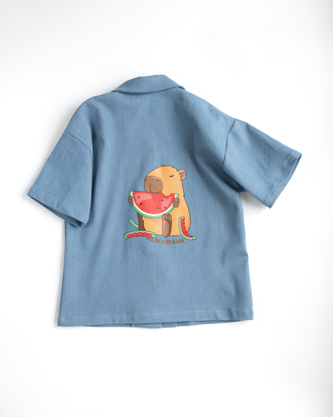 Back view of kids denim shirt with cheerful capybara print – Alwair Kids