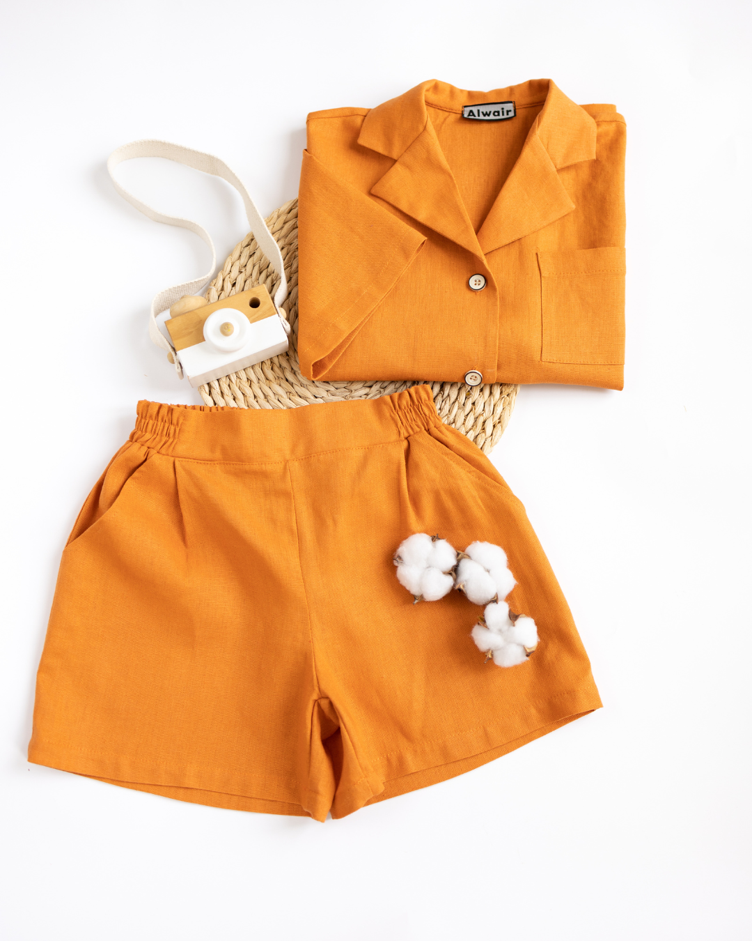 Folded linen summer set for kids with cotton balls and toy camera by Alwair Kids