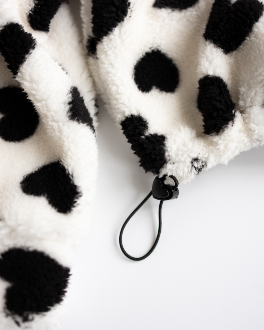 Elastic stopper detail on heart print pullover – Alwair Kids