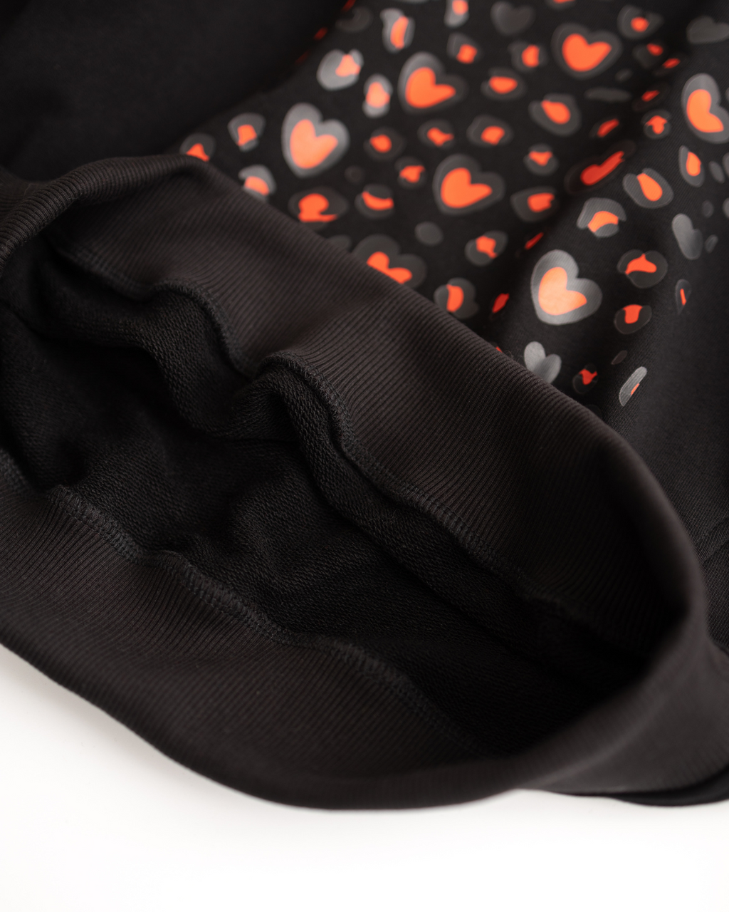 Inside view of fleece-lined kids sweatshirt in black