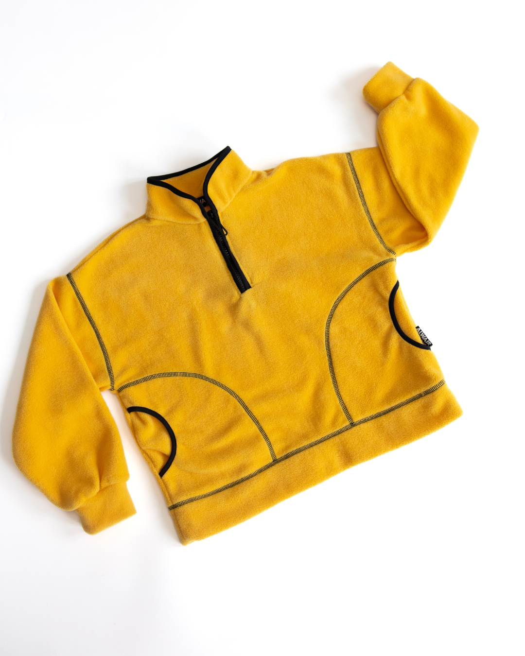 Alwair Kids fleece pullover in black and yellow colorways side by side