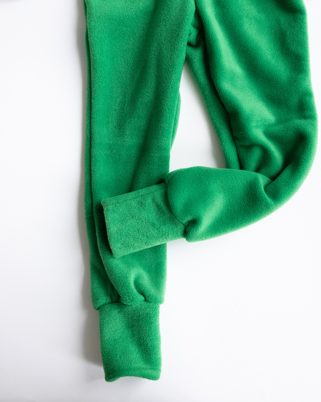 Foldable ankle cuffs on green fleece overall – long-lasting wear