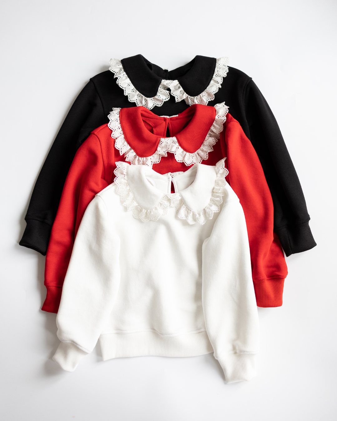 Three lace collar sweatshirts in red, white, and black