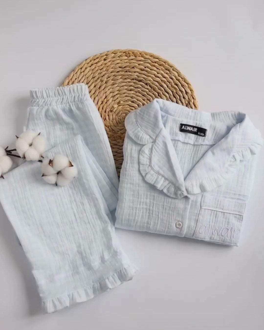 Soft muslin girls' pajama sets in pastel check – close-up and 360° view of fabric, ruffles, and details from Alwair Kids