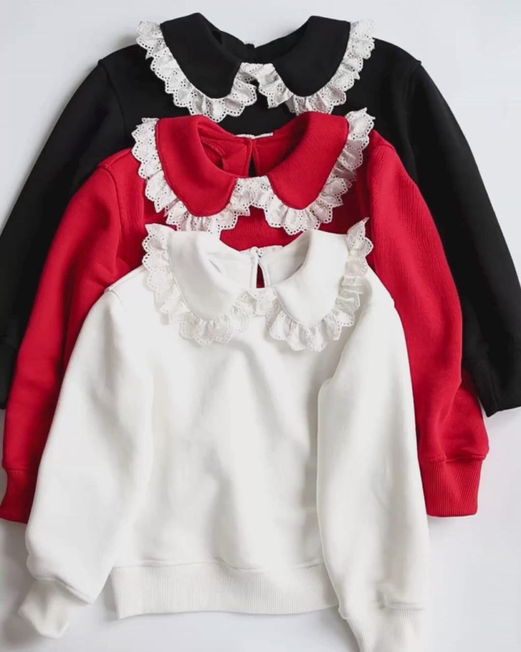 Video of lace collar girls’ sweatshirt in red – close-up details

