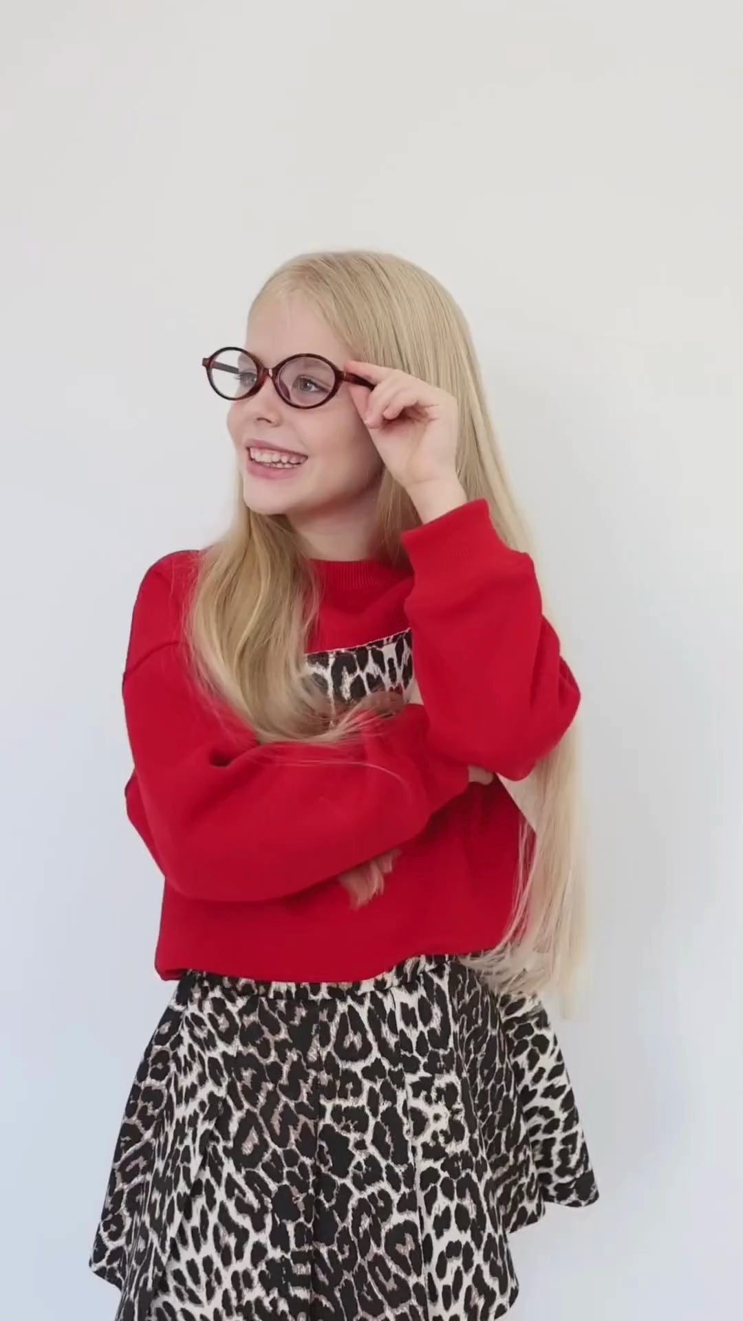 Child wearing a leopard print skirt by Alwair Kids – flowy silhouette with a playful, wild charm perfect for everyday or special occasions.


