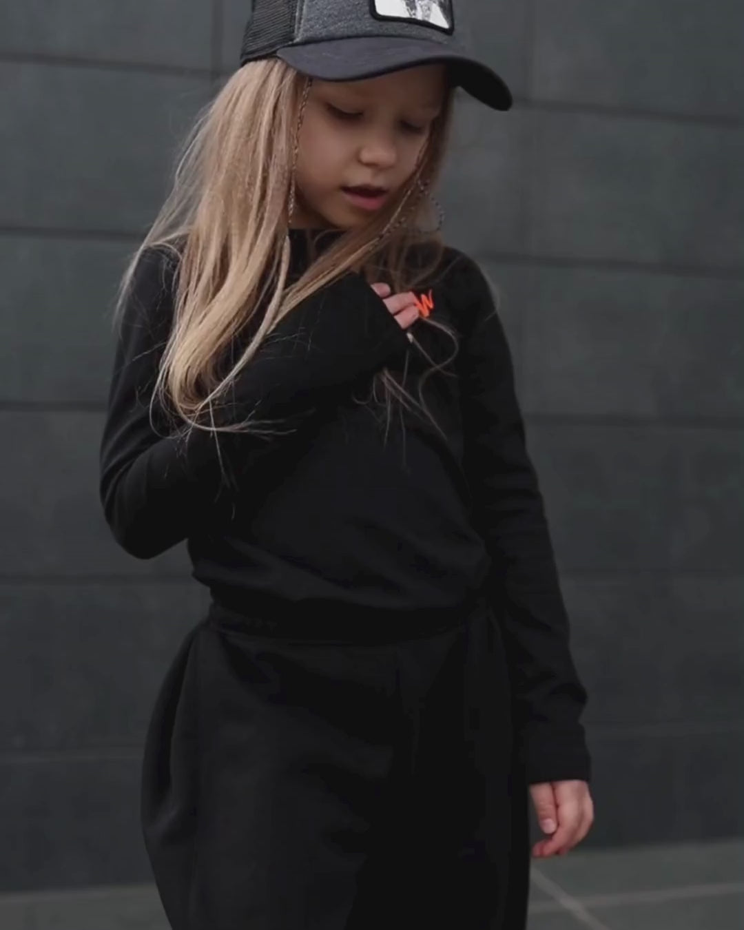 Video of girl modeling beige Alwair Kids cotton longsleeve