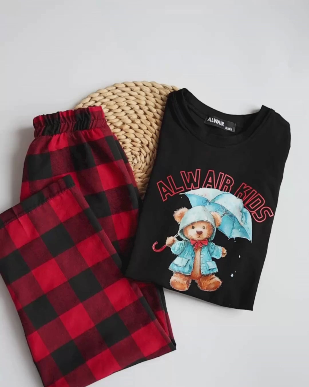Video of Alwair Kids unisex cotton pajamas with bear print top and red plaid pants – close-up details and fabric texture