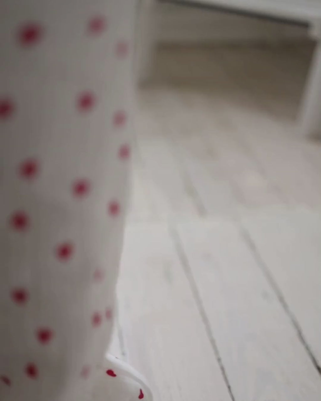 Video of smiling girl in Alwair Kids pajama set with red hearts, showing fit and movement