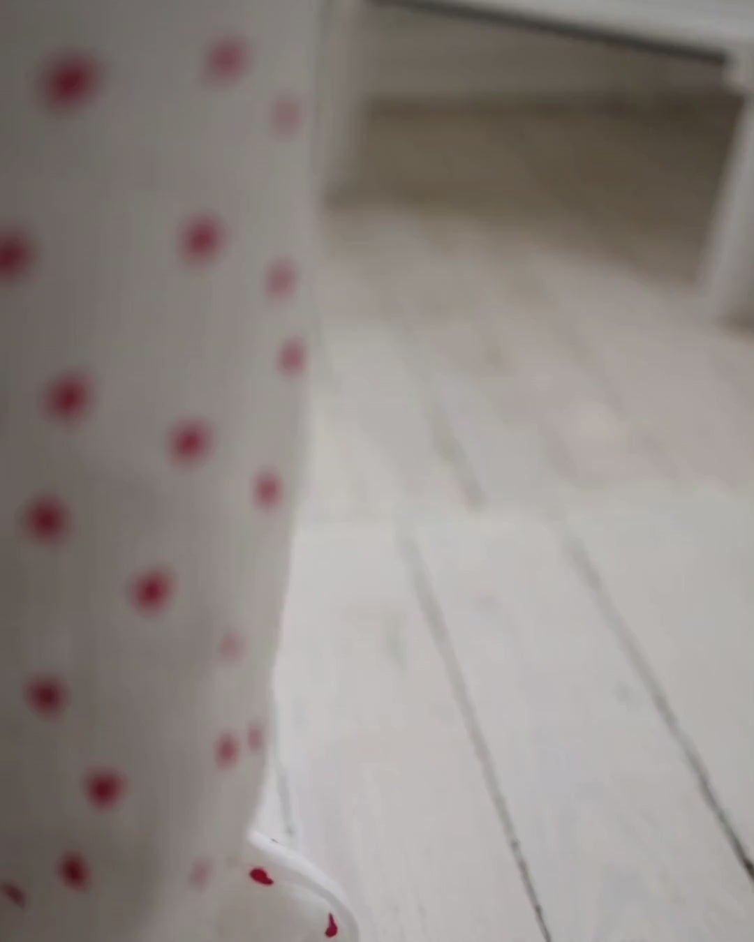 Video of smiling girl in Alwair Kids pajama set with red hearts, showing fit and movement